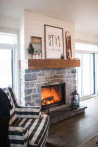 Fall KonMari Challenge Sage of Interiors Christine Thorn living room with fireplace and autumn fire